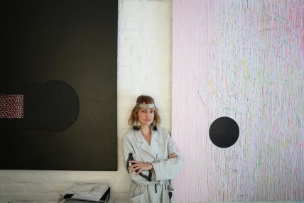 Milena in her studio April 2022.jpg
